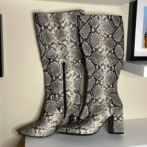 Snakeprint knee high boots